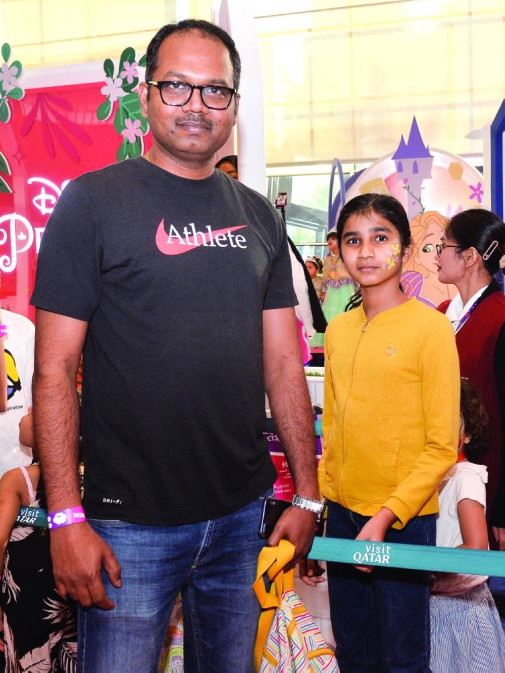 
Left: Tamil with his daughter. 