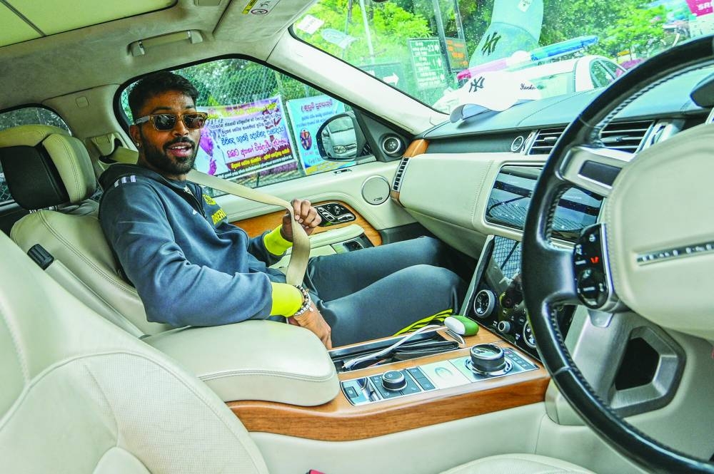 India’s Hardik Pandya arrives at the Bandaranaike International Airport in Colombo on Monday for the upcoming Twenty20 and ODI series against Sri Lanka. (AFP)
