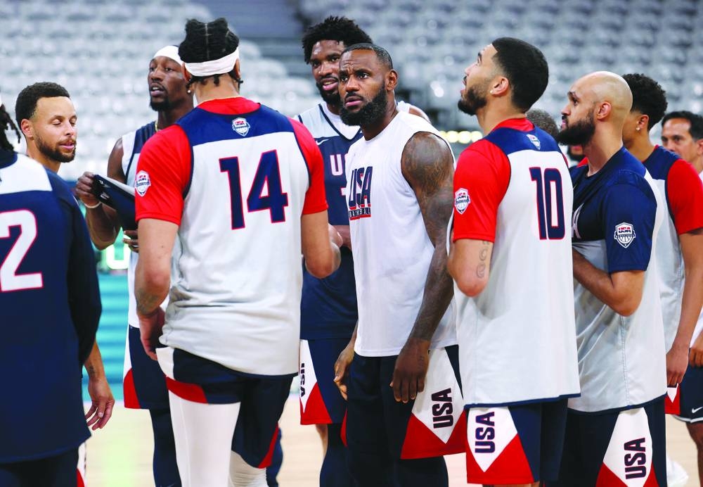 US forward LeBron James (centre) and teammates take part in a training session at the Pierre-Mauroy stadium in Villeneuve-d’Ascq, northern France, ahead of the Paris 2024 Olympic Games. (AFP) 