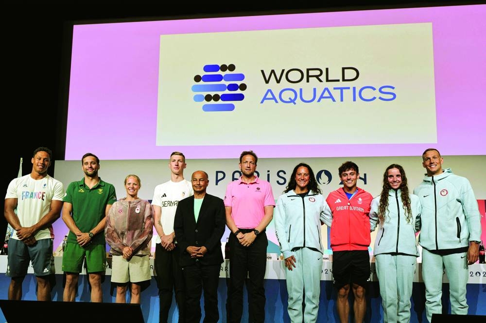 FROM LEFT: France’s water polo player Thomas Vernoux, South Africa’s swimmer Chad Le Clos, Canada’s swimmer Jacqueline Simoneau, Germany’s swimmer Florian Wellbrock, World Aquatics President Husain al-Musallam and Executive Director Brent Novicki, US’ water polo player Maggie Steffens, Britain’s Diver Tom Daley, and US’ swimmers Regan Smith and Caeleb Dressel pose during the World Aquatics Olympic press conference on Thursday, ahead of the Paris 2024 Olympic Games in Paris. (AFP)