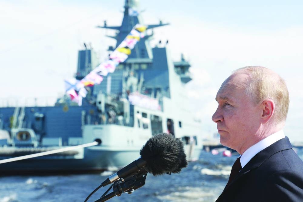 Russian President Vladimir Putin attends the main naval parade marking the Russian Navy Day in Saint Petersburg yesterday. (AFP)