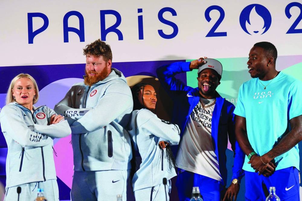 FROM LEFT: American athletes Katie Moon, Ryan Crouser, Tara Davis-Woodhall, Noah Lyles and Grant Holloway attend a press conference during the Paris 2024 Olympic Games in Paris on Monday. (AFP)