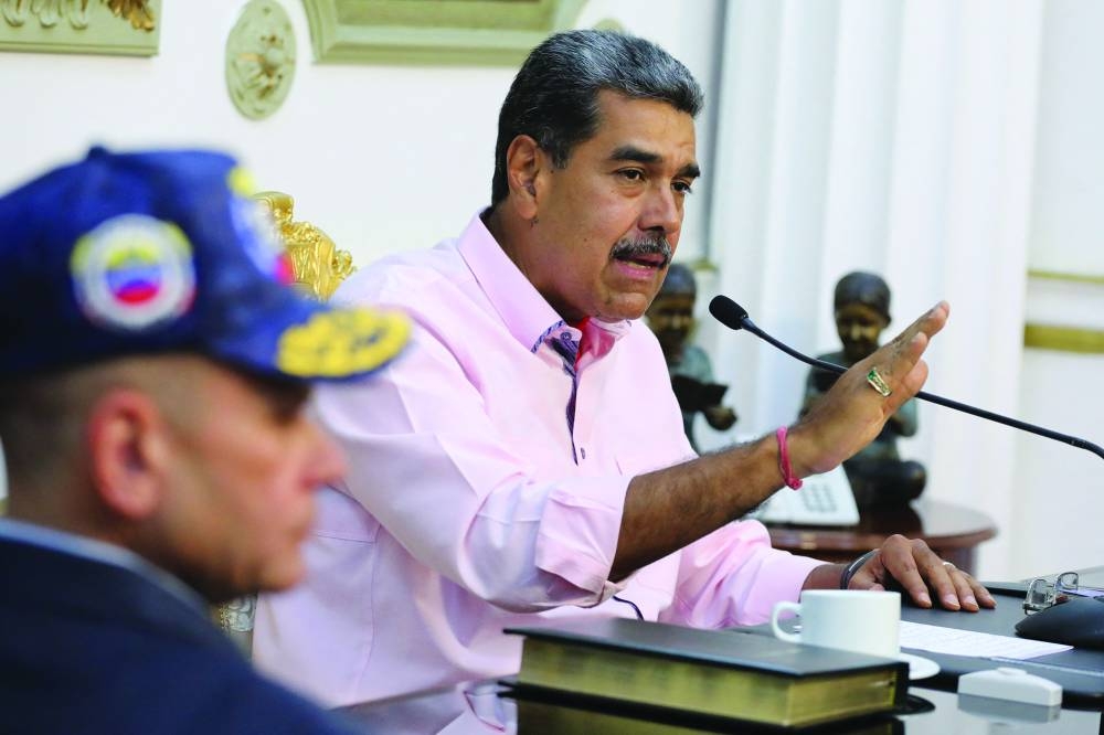 
This handout picture released by Venezuelan Presidency shows President Maduro 
addressing the nation after the Venezuelan presidential election. – AFP 