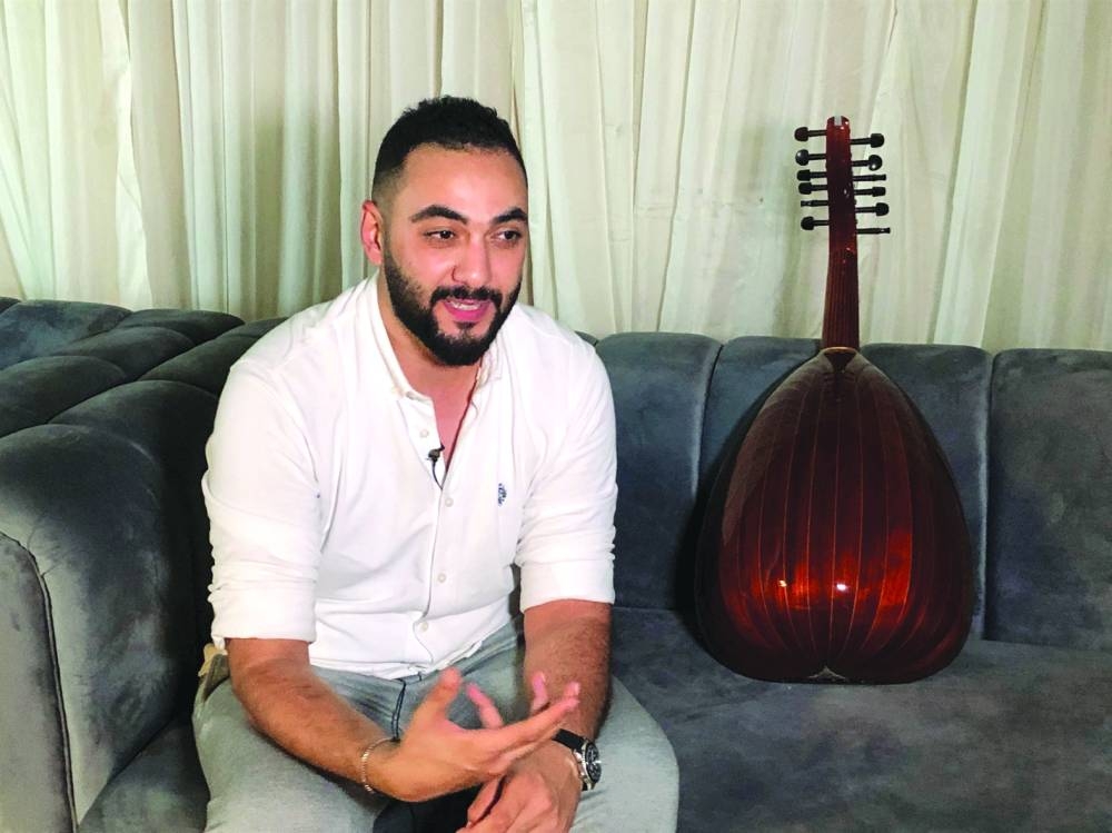 Palestinian musician and oud player Raouf Belbeisi speaks during an interview with Reuters, after he took part in organising a community event, introducing Gazan musicians who fled to Egypt to the country's local industry and helping them restart their careers, at the Cairo Citadel, Egypt.