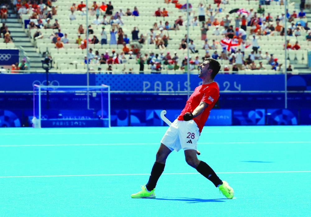 Lee Morton of Britain celebrates scoring their second hockey goal against Netherlands at Paris 2024 Olympics at Yves-du-Manoir Stadium, Colombes, France, on Tuesday. (Reuters)