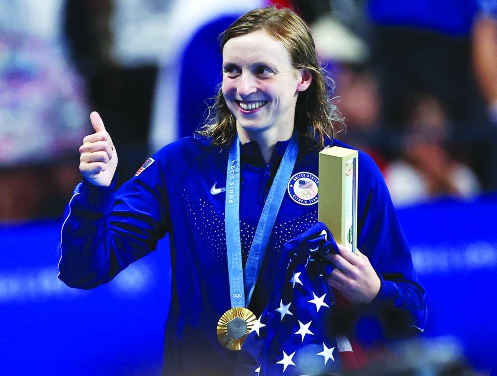 Katie Ledecky of the US celebrates after winning the Women’s 1,500m freestyle. 