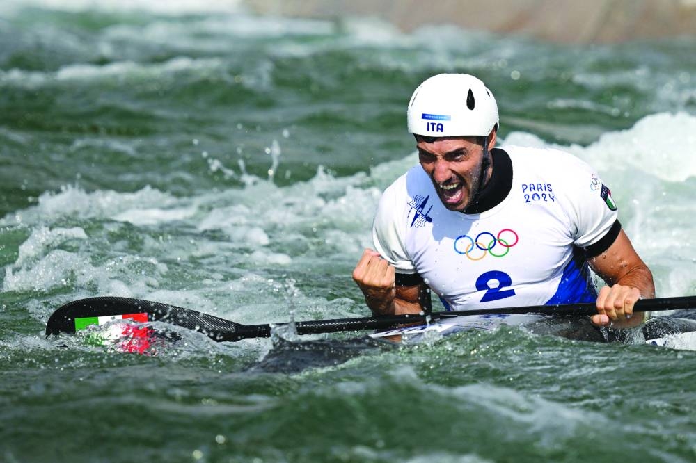 Italy’s Giovanni De Gennaro reacts after competing for the gold in the men’s kayak final of the canoe slalom competition in Vaires-sur-Marne during the Paris 2024 Olympic Games on Thursday. (AFP) 