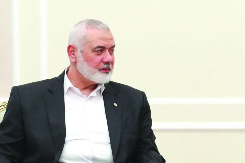 Palestinian group Hamas' top leader Ismail Haniyeh meets with Iranian President Masoud Pezeshkian in Tehran, Iran, July 30, 2024.