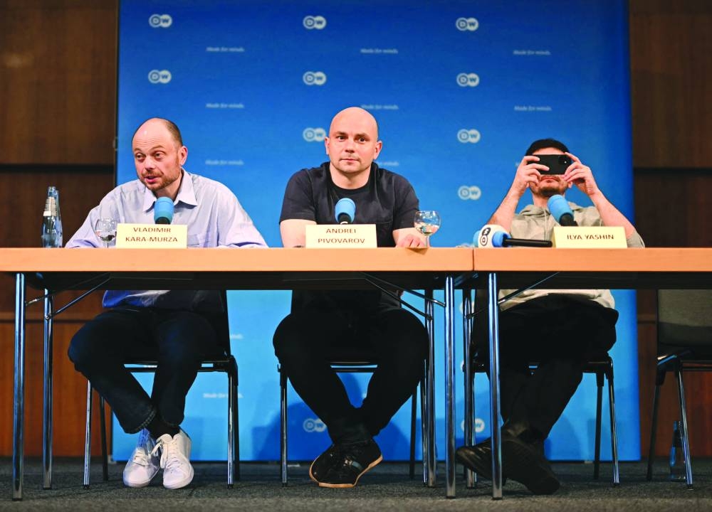 Russian journalist and activist Vladimir Kara-Murza (left), Russian activist Andrei Pivovarov and Russian opposition figure Ilya Yashin (right) address a press conference in Bonn, one day after they have been released from Russia as political prisoners in one of the biggest prisoner swaps between Russia and the West since the end of the Cold War. – AFP 