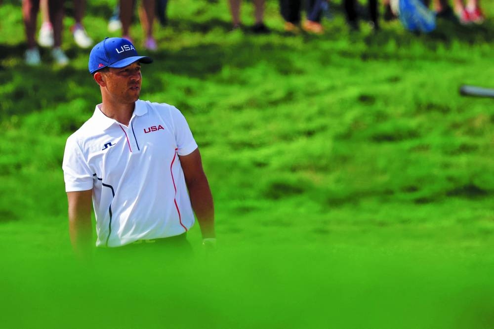 
Xander Schauffele of the US looks on in round 2 of the golf individual stroke play of the Paris 2024 Olympic Games at Le Golf National in Guyancourt on Friday. (AFP) 