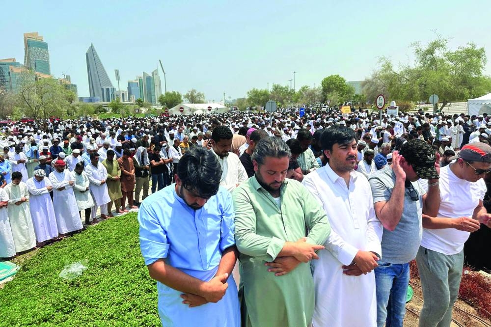 
Hundreds of Muslims offer funeral prayer in the grounds close to the Imam Muhammad bin Abdul Wahhab Mosque in Doha for Ismail Haniyeh, the Hamas chief, yesterday. 