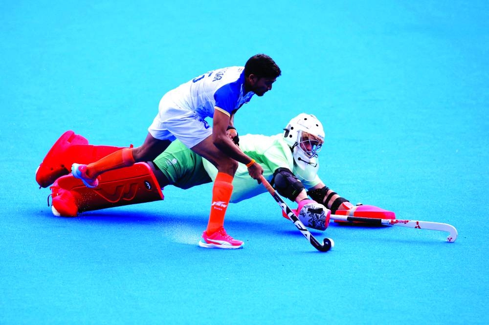 Raj Kumar Pal of India scores the winning goal during the penalty shootout in the men’s hockey quarter-final at the Paris 2024 Olympics in Yves-du-Manoir Stadium, Colombes, France, yesterday. (Reuters)