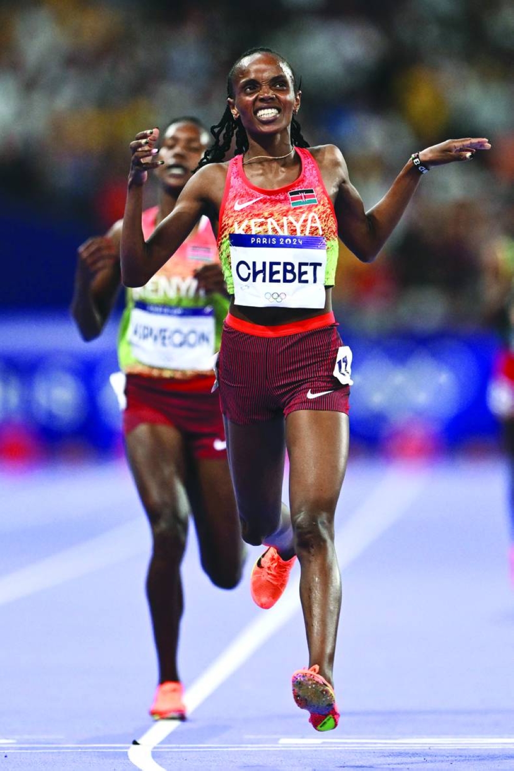 Kenya’s Beatrice Chebet crosses the finish line to win the women’s 5,000m final yesterday. (AFP) 