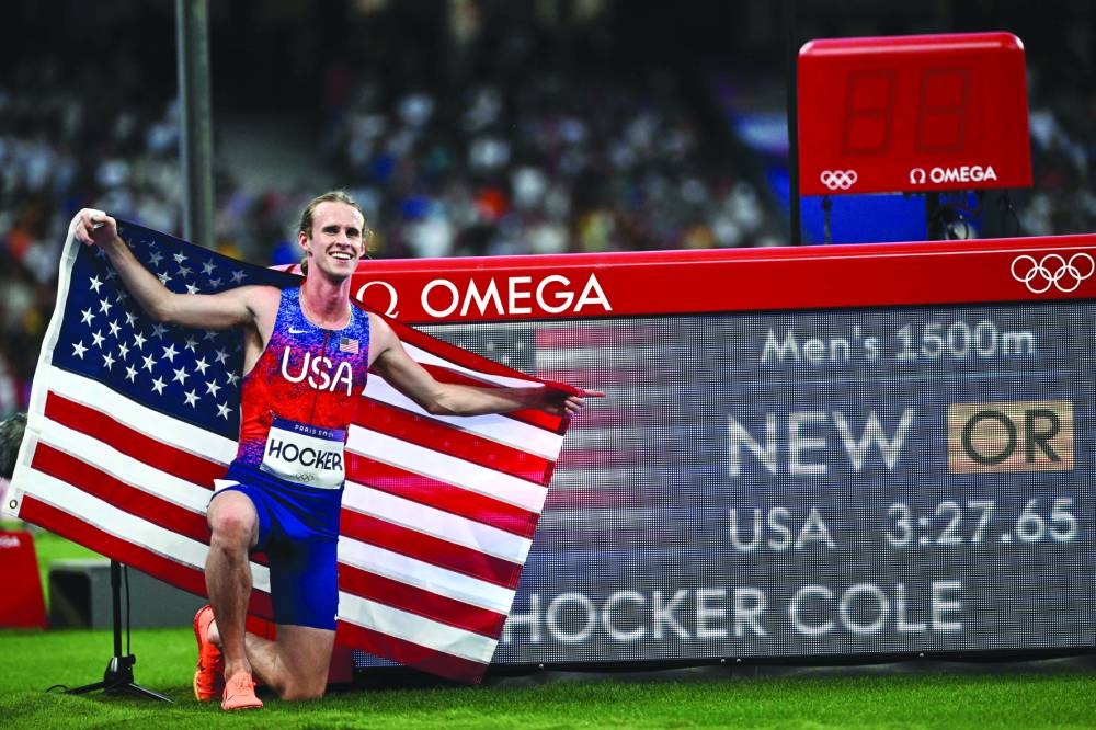 Cole Hocker celebrates winning the men’s 1500m final on Tuesday. (AFP)