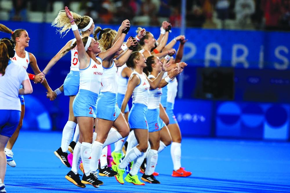 The Netherlands women’s hockey team celebrates after winning final in the Paris Olympics 2024 against China on Friday. (Reuters)