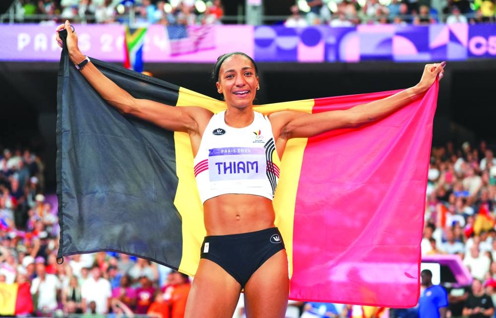 
Nafissatou Thiam of Belgium celebrates after winning the heptathlon gold. 