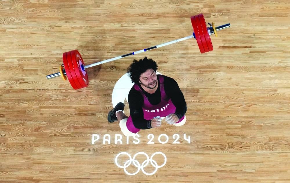 Qatar’s Fares Ibrahim reacts after failing to make a lift in Paris on Saturday. (Reuters) 