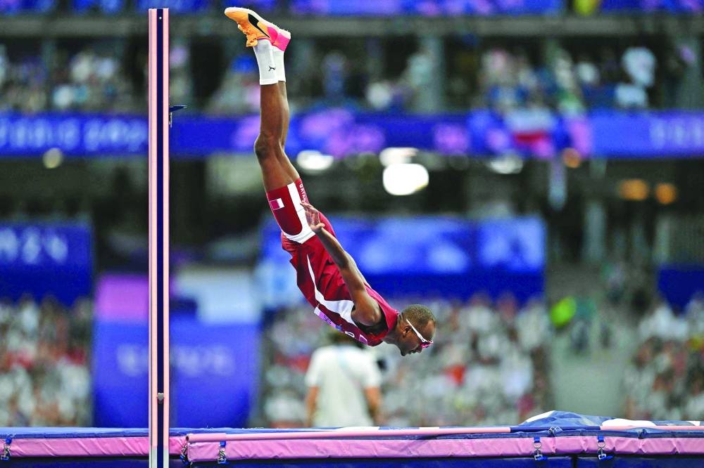 Qatar’s Mutaz Barshim reacts after winning the bronze medal at the Paris Olympic Games on Saturday. (AFP) 