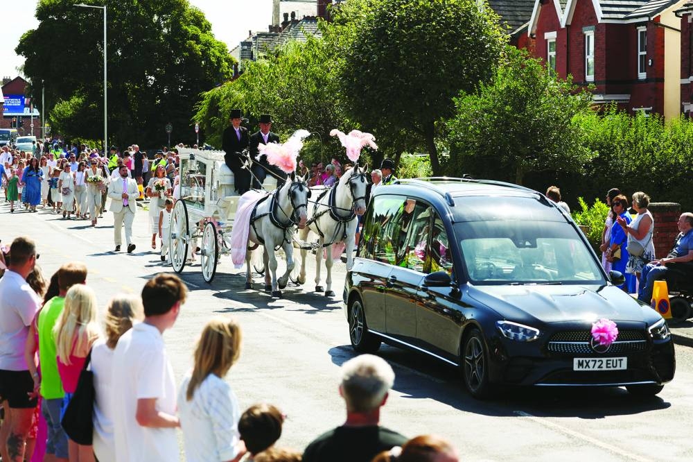 
The coffin of Alice Dasilva Aguiar, one of the three children who were victims of a knife attack during a dance event, arriving at St Patrick’s Catholic Church in Southport. – Reuters 