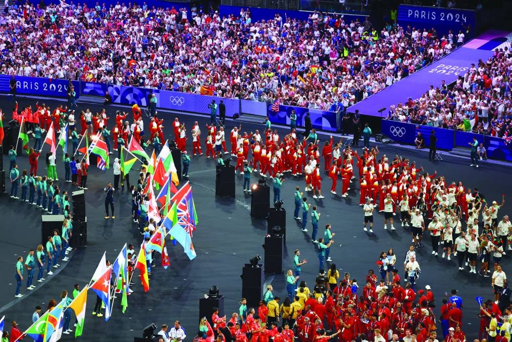 
Athletes at the closing ceremony at the Stade de France. 