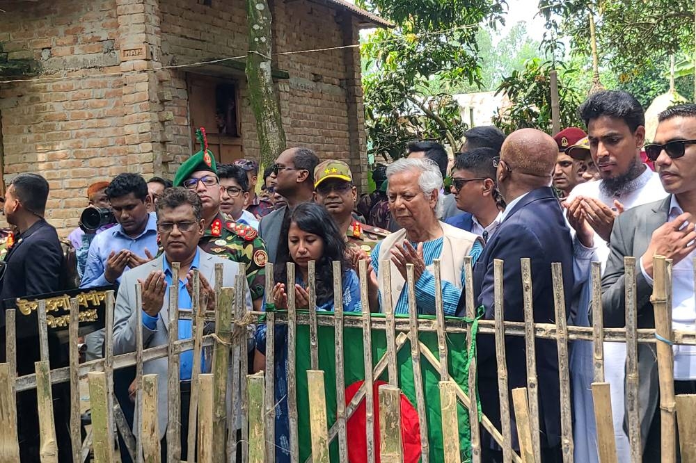 Nobel laureate and chief adviser of Bangladesh's new interim government, Muhammad Yunus (6R) visits slain Abu Sayeed's house, who was killed by police during the anti-quota protests, in Rangpur on August 10. AFP