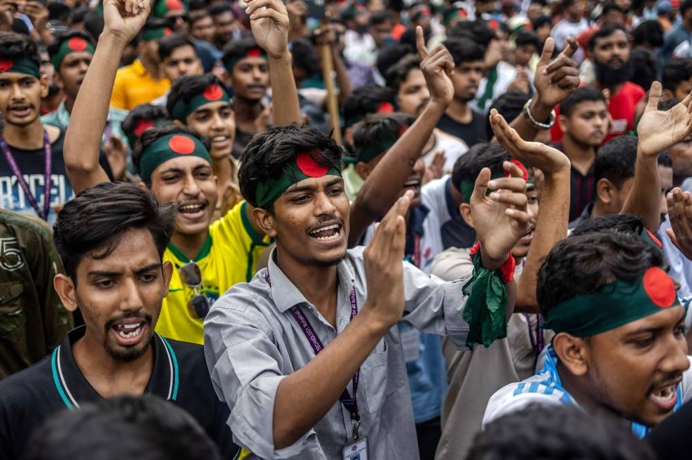 Students chant slogans as they protest to demand accountability and trial against Bangladesh's ousted Prime Minister Sheikh Hasina, near Dhaka University in the capital on Monday. AFP