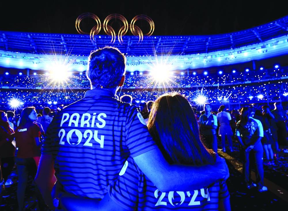 Athletes and the Olympic rings are pictured during the closing ceremony. (Reuters)