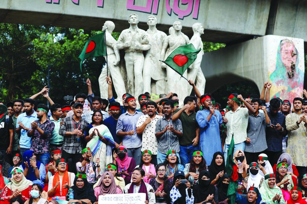 Activists of the Anti-Discriminatory Student Movement gather at the University of Dhaka’s Teacher Student Center, demanding the capital punishment for Bangladeshi former prime minister Sheikh Hasina for the deaths of students during anti-quota protests, in Dhaka, yesterday.
