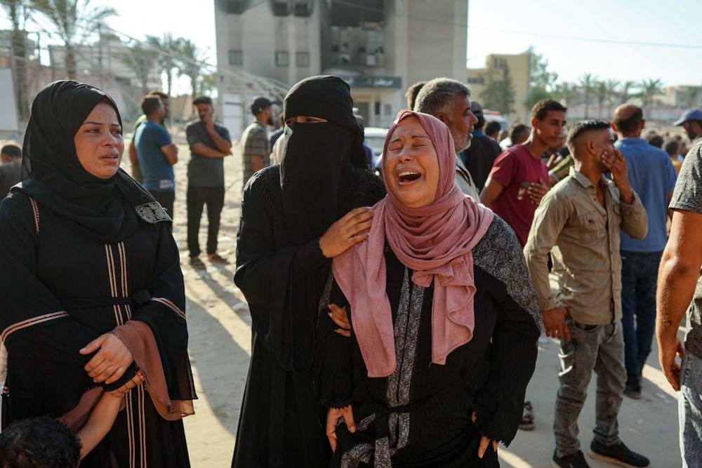 A Palestinian woman mourns a family member killed in Israeli bombardment, at the Nasser hospital in Khan Yunis in the southern Gaza Strip on Wednesday. AFP