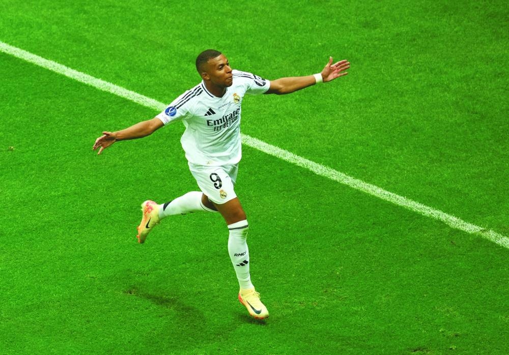 Real Madrid’s Kylian Mbappe celebrates after scoring their second goal against Atalanta on Wednesday. (Reuters) 