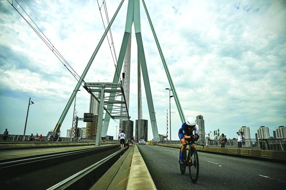 Tashkent City Women Professional Cycling Team’s rider Yanina Kuskova competes during the 3rd stage of the third edition of the Women’s Tour de France race in Rotterdam on Tuesday. (AFP) 