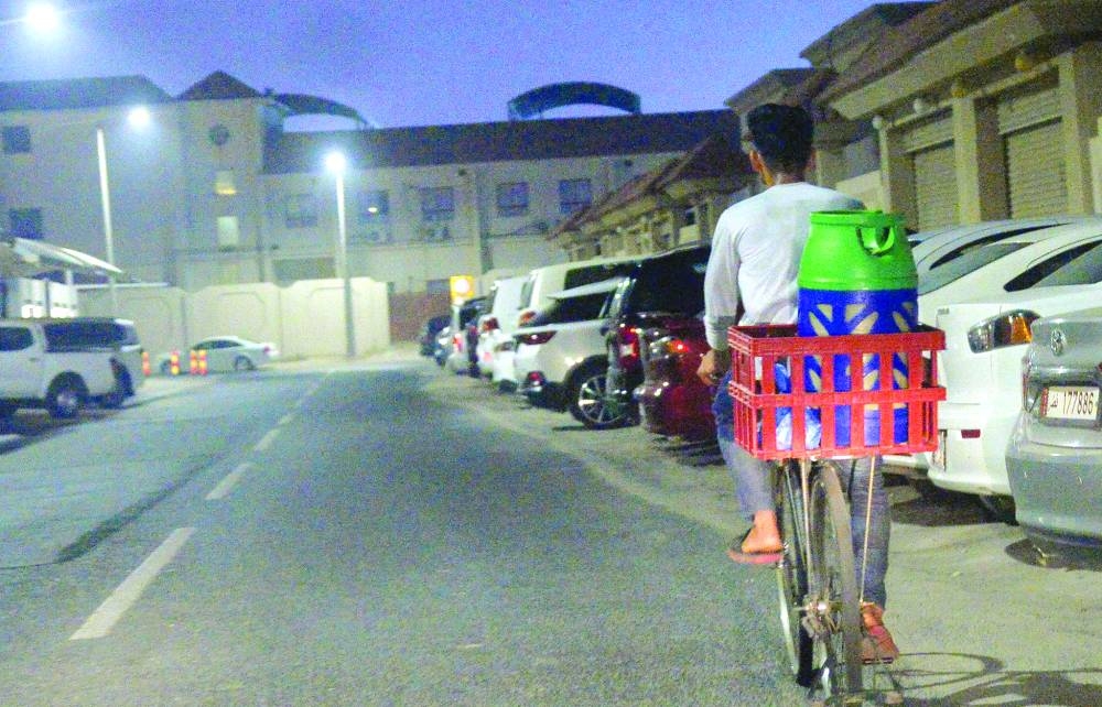 A delivery rider without safety gear.