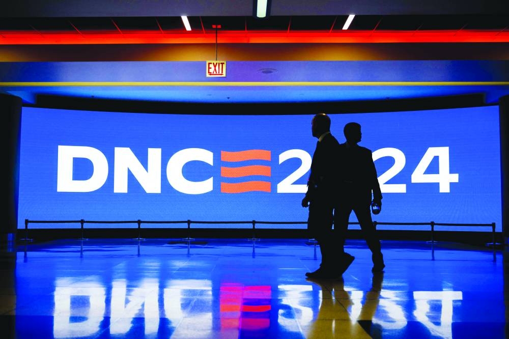 Security personnel walk through hallways at the United Centre during preparations ahead of the Democratic National Convention (DNC) in Chicago. – AFP