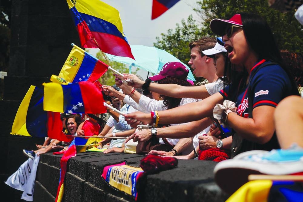 
People take part in a protest in Mexico City. – AFP 
