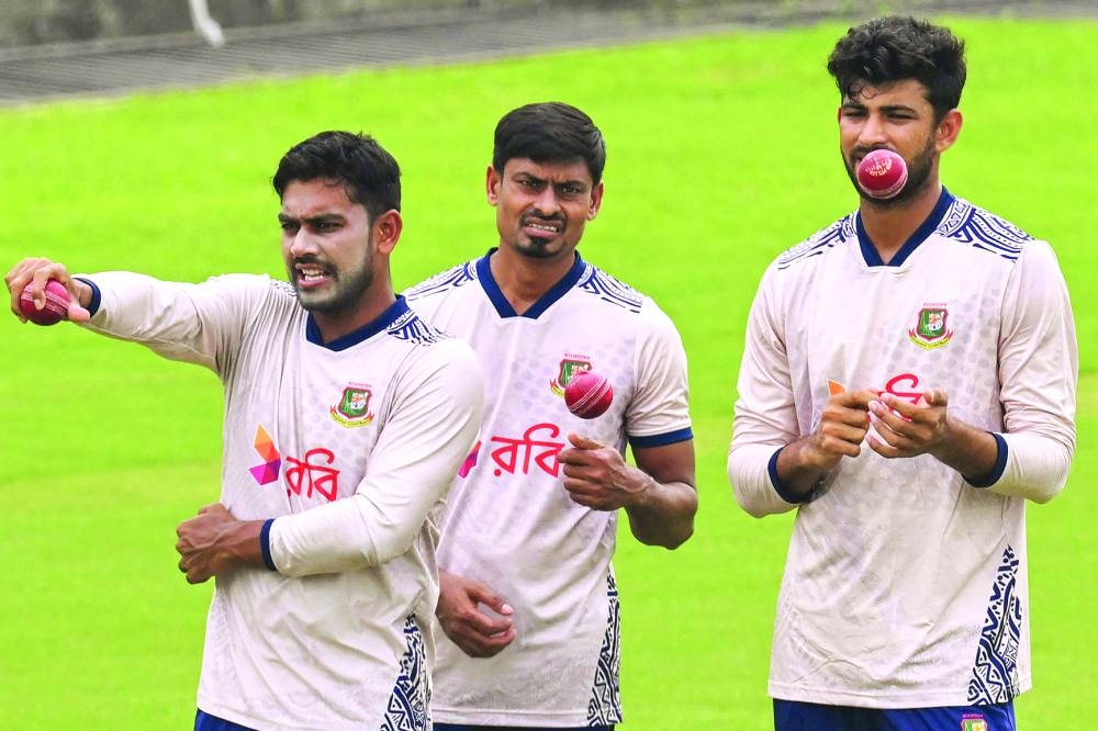 Bangladesh’s Nayeem Hasan (right), Taijul Islam (centre) and Mehidy Hasan Miraz attend a training session at the Rawalpindi Cricket Stadium in Rawalpindi ahead of their first Test against Pakistan. Right: Pakistan’s Mohamed Rizwan (left), captain Shan Masood (centre) and Naseem Shah attend a training session at the Rawalpindi Cricket Stadium. (AFP) 