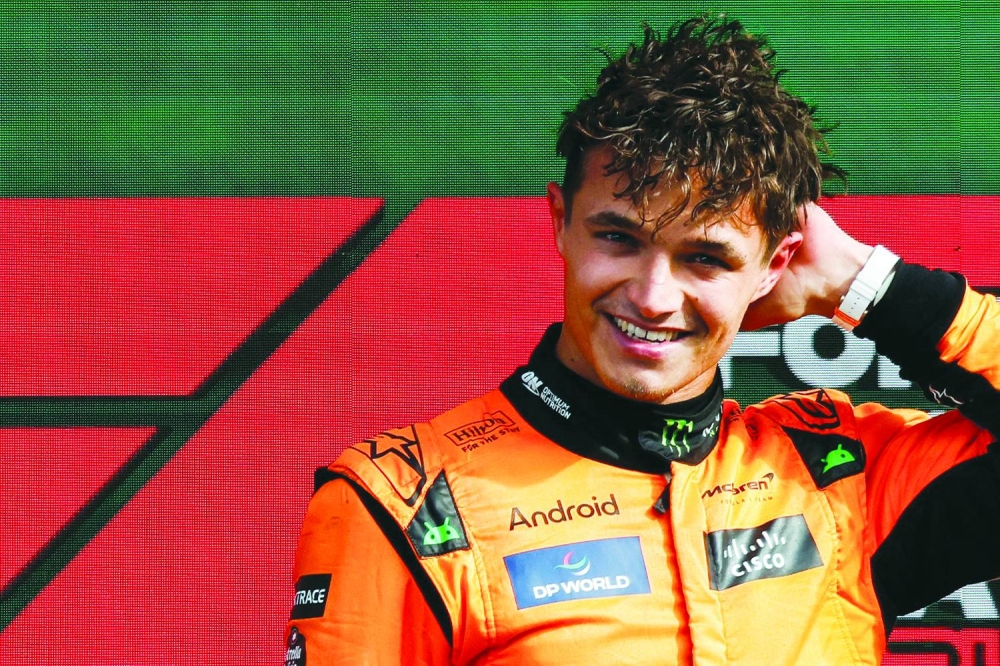 
Winner McLaren’s British driver Lando Norris celebrates during the podium ceremony. (AFP) 