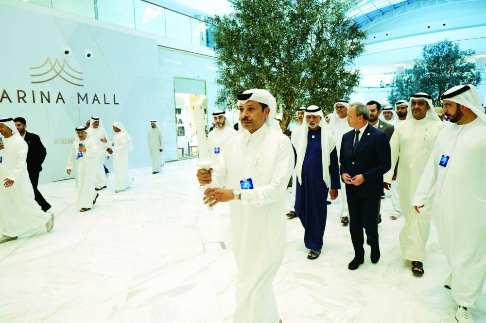 President of the Qatar Chess Association Mohamed al-Mudahka is seen with officials at the FIDE Torch Relay held at Marina Mall, Abu Dhabi. The QCA president also carried the torch during the event besides playing against 15 players at the chess festival. 