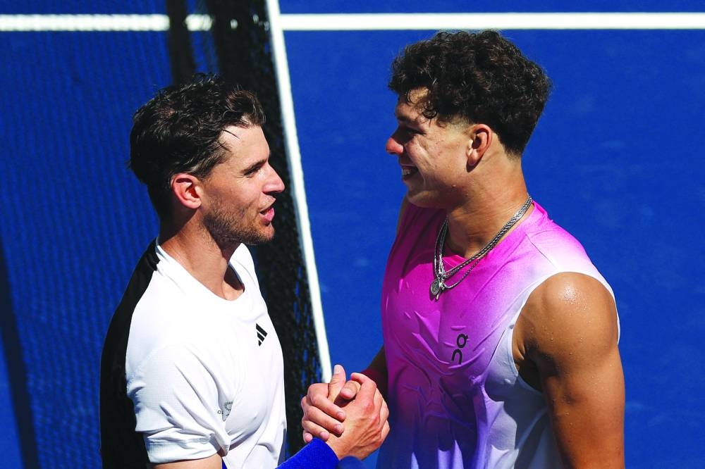 Ben Shelton (right) of the USA shakes hands with Dominic Thiem of Austria after his victory at the USTA Billie Jean King National Tennis Centre. (AFP) 
