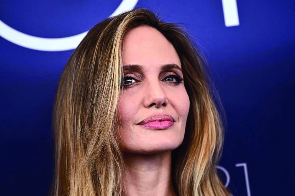 Angelina Jolie attends the photocall of the movie Maria during the 81st International Venice Film Festival at Venice Lido, yesterday. 