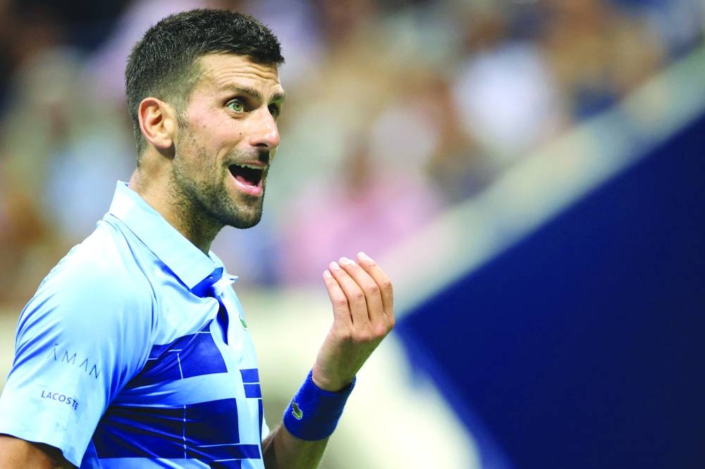 Serbia’s Novak Djokovic reacts during his second-round match against Serbia’s Laslo Djere. (AFP)