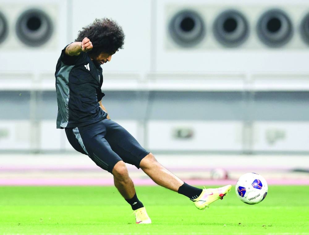 Qatar’s forward Akram Afif trains at the Khalifa International Stadium. 