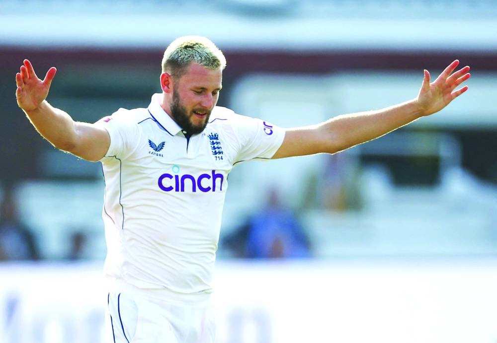 England’s Gus Atkinson celebrates after taking the wicket of Sri Lanka’s Milan Rathnayake during the second Test at Lord’s Cricket Ground in London on Sunday. (Reuters)