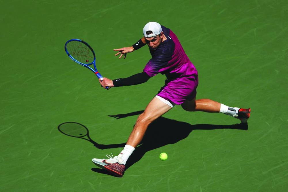 Jack Draper of Great Britain returns a shot against Tomas Machac of Czech Republic during their fourth-round match on Day 8 of the 2024 US Open at USTA Billie Jean King National Tennis Center in New York on Monday. Centre: Jessica Pegula celebrates after beating Diana Shnaider. Right: Daniil Medvedev of Russia returns a shot against Nuno Borges of Portugal. (AFP)