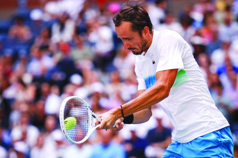 Czech Republic's Tomas Machac hits a return to Britain's Jack Draper during their singles round of 16 match on day eight of the US Open at the USTA Billie Jean King National Tennis Center in New York City on Monday. (AFP)