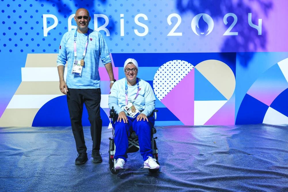 Sara Masoud with her coach Walid Maghmoul in Paris on Wednesday.