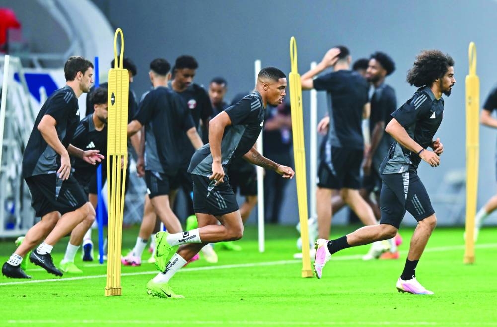 Qatar players train at the Ahmad Bin Ali Stadium on Wednesday, on the eve of the 2026 FIFA World Cup qualifying match against the United Arab Emirates. PICTURES: Noushad Thekkayil