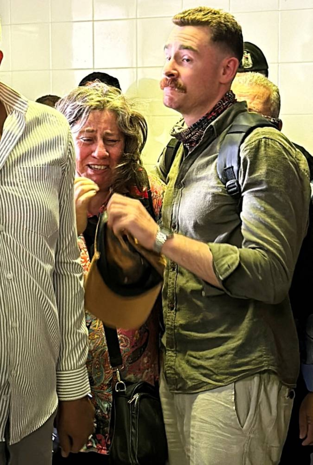 People react as they gather at a hospital after a US citizen, who was taking part in a protest against settlement expansion, died of her wounds after being shot in the head by Israeli troops, in Nablus, Israeli-occupied West Bank, Friday. REUTERS