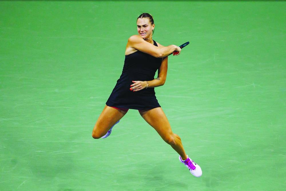 Sep 5, 2024; Flushing, NY, USA; Aryna Sabalenka of Belarus hits the ball to Emma Navarro of the United States on day eleven of the U.S. Open tennis tournament at the USTA Billie Jean King National Tennis Center. Mandatory Credit: Mike Frey-Imagn Images