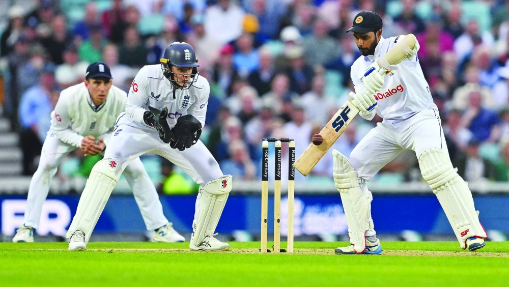 Sri Lanka’s captain Dhananjaya de Silva plays a shot on day two of the third Test match against England at The Oval cricket ground in London on Saturday. (AFP)