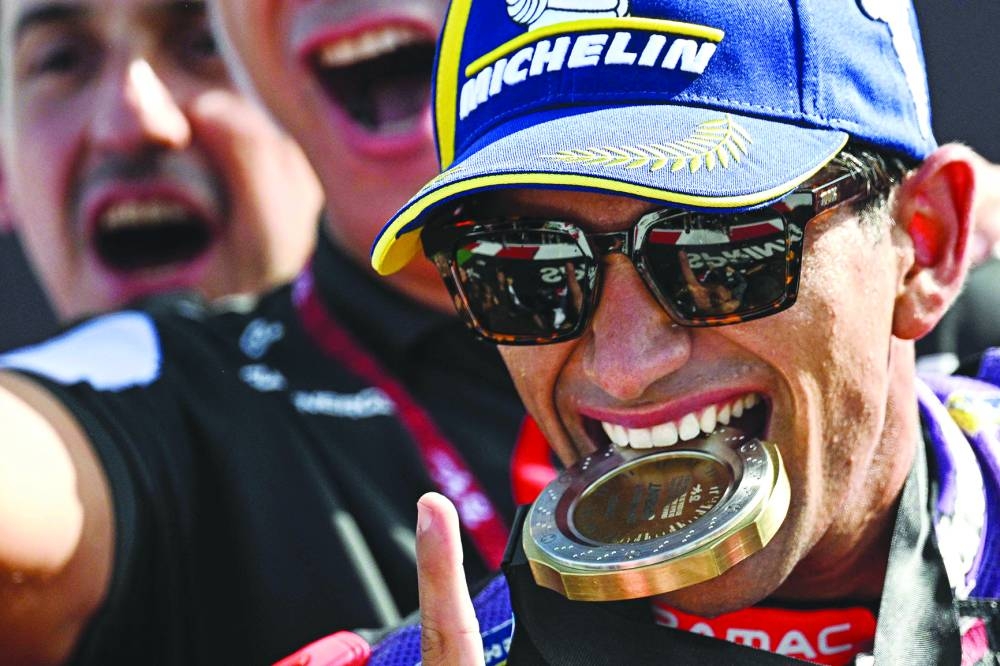 Ducati Spanish rider Jorge Martin celebrates after winning the sprint race of the San Marino MotoGP Grand Prix at the Misano World Circuit Marco-Simoncelli in Misano Adriatico on Saturday. (AFP)